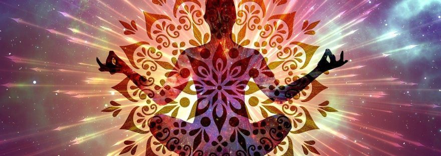 This image shows a human meditating and enveloped in light in a post by Haripriya Suraj, Reiki Master, on overcoming fear of ghosts and evil spirits